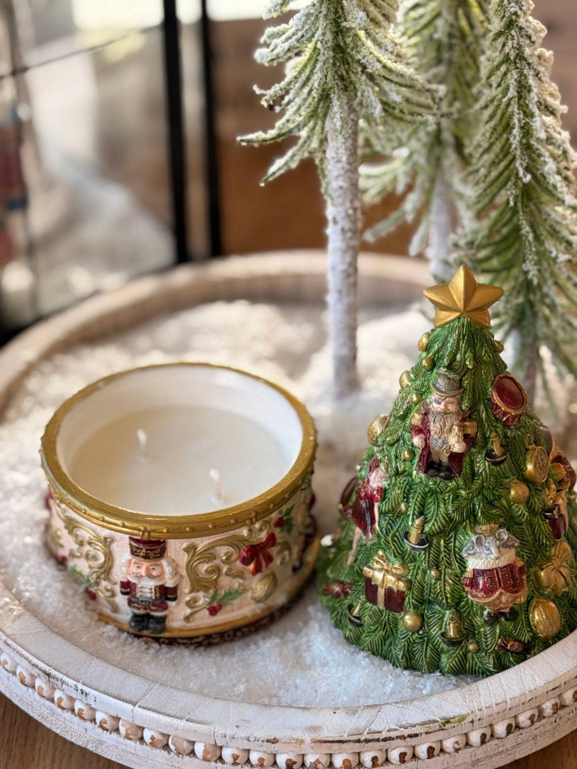 Hand-painted Nutcracker Christmas tree candle and candle vessel styled for the holidays