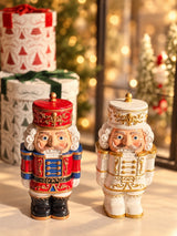 Festive red and pearl white Nutcracker candles displayed together