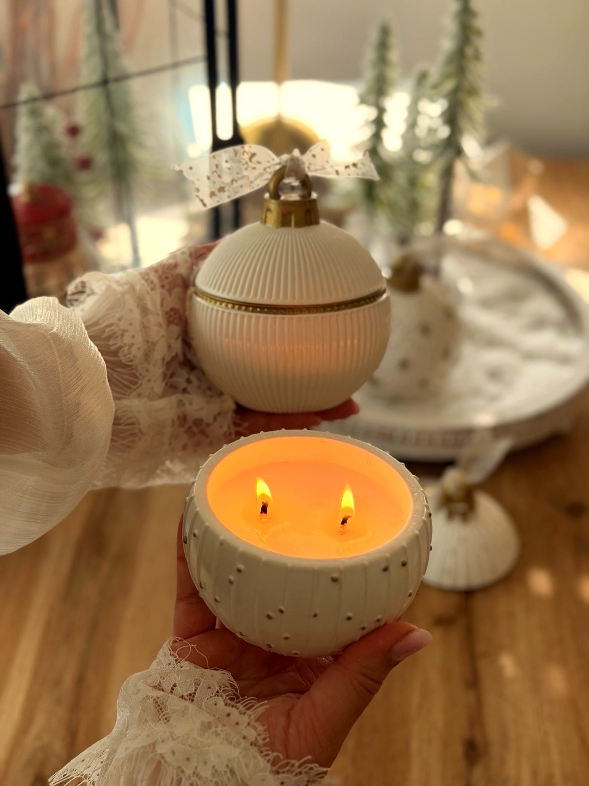 North Pole candle ornament adding a cozy glow to Christmas home decor