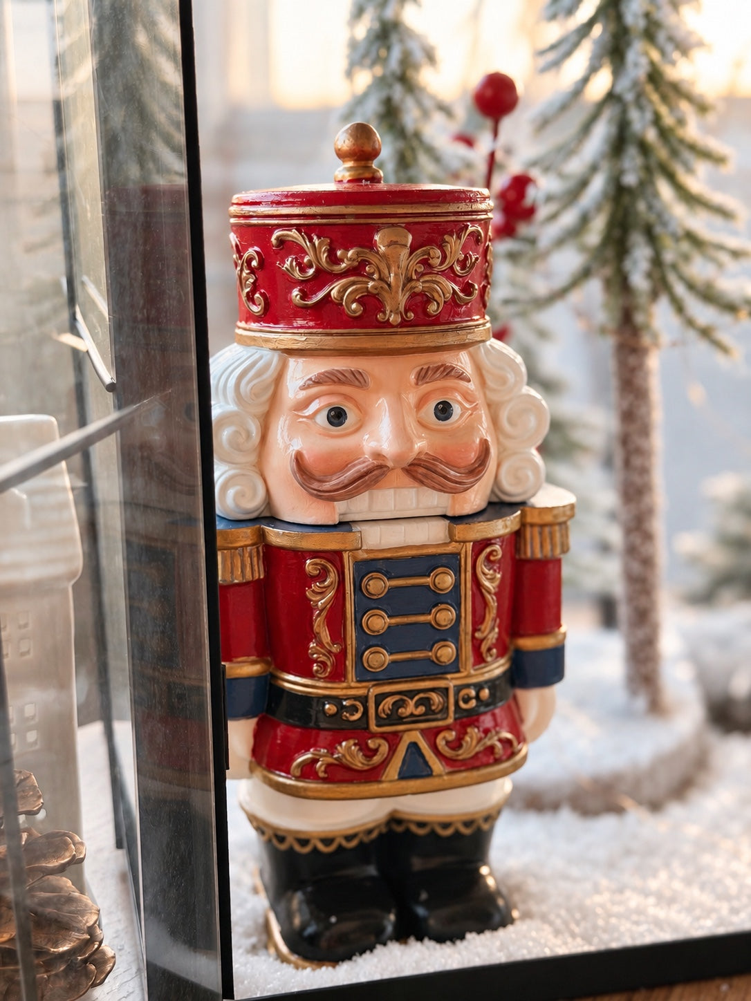 Close-up of the hand-painted Nutcracker Candle with ornate gold detailing