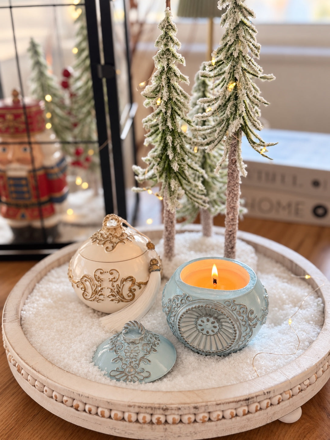 Blue and ivory Romanov Secret candles displayed together