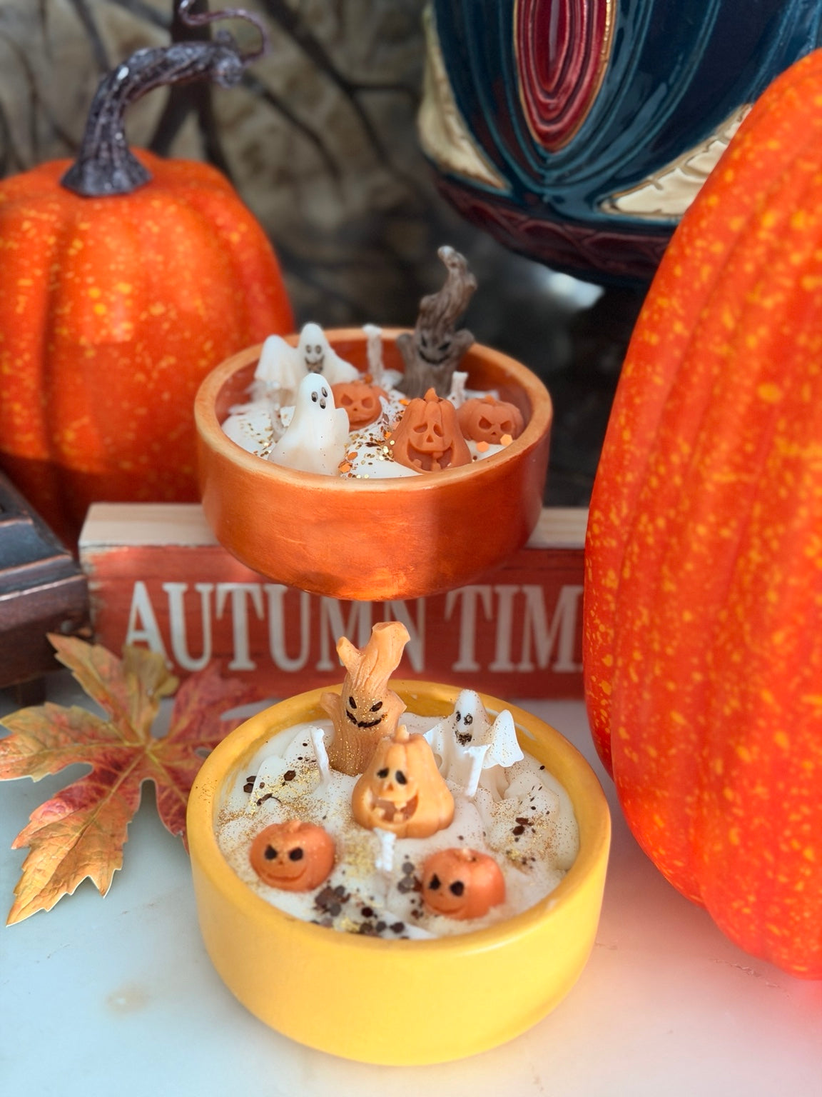 Spooky Candle styled with autumn pumpkins