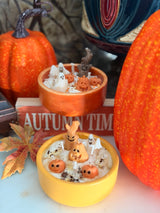 Spooky Candle styled with autumn pumpkins